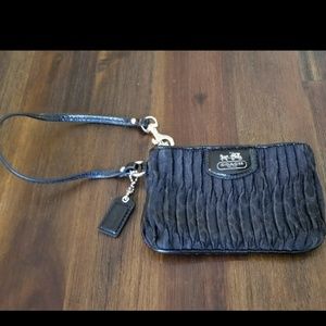 Black coach wristlet needs cute night out